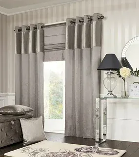 Elegant gray curtains frame a large window in a stylish room