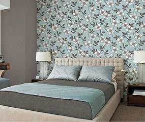 Modern bedroom with a floral patterned wallpaper