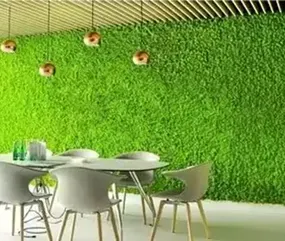 Modern dining area featuring a vibrant green living wall