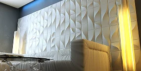 Modern living room featuring a textured white wall, a sleek white sofa