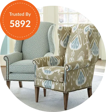 Two stylish wingback chairs in patterned fabrics